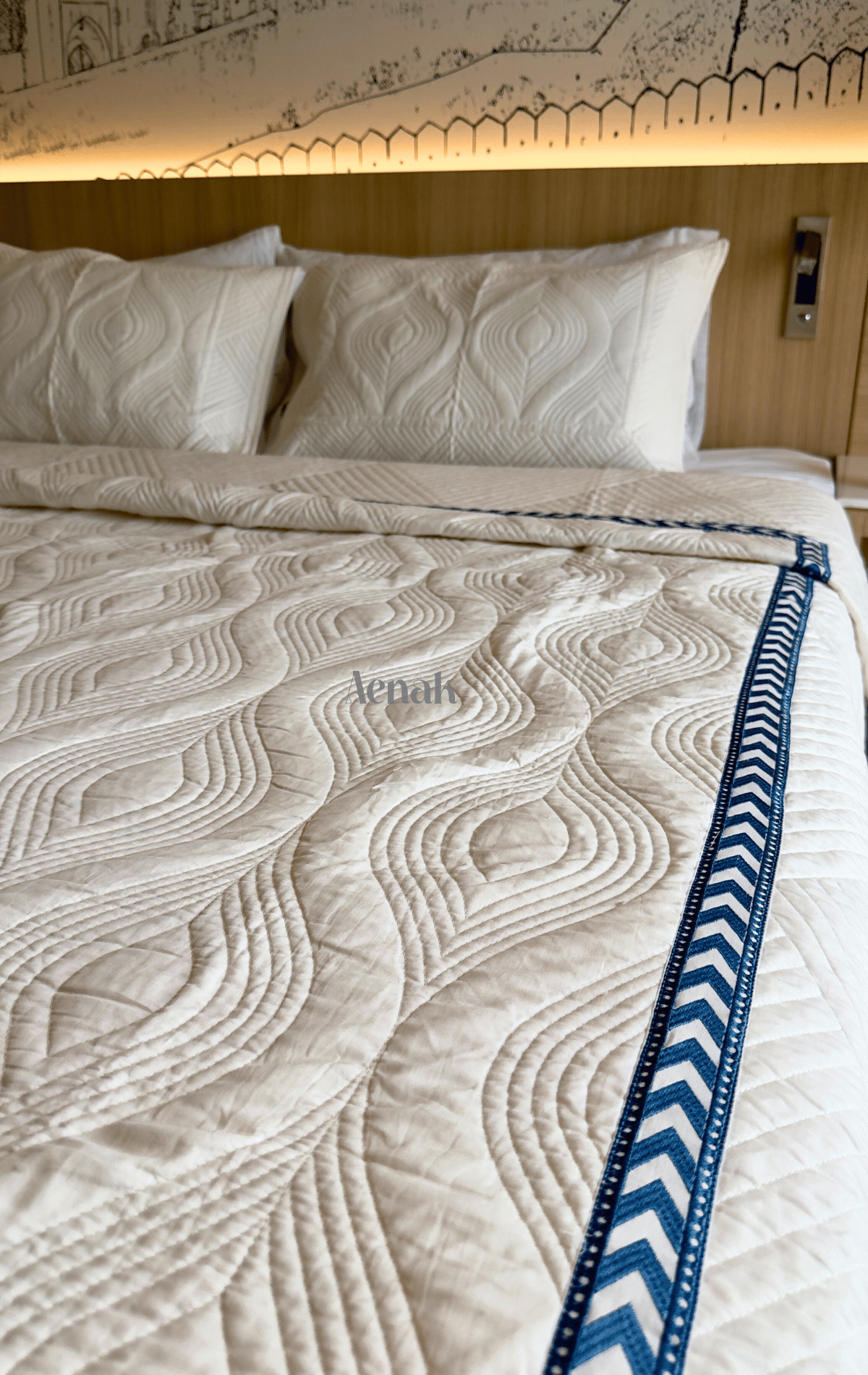 White Embossed Quilted Bedcover with Blue Lace