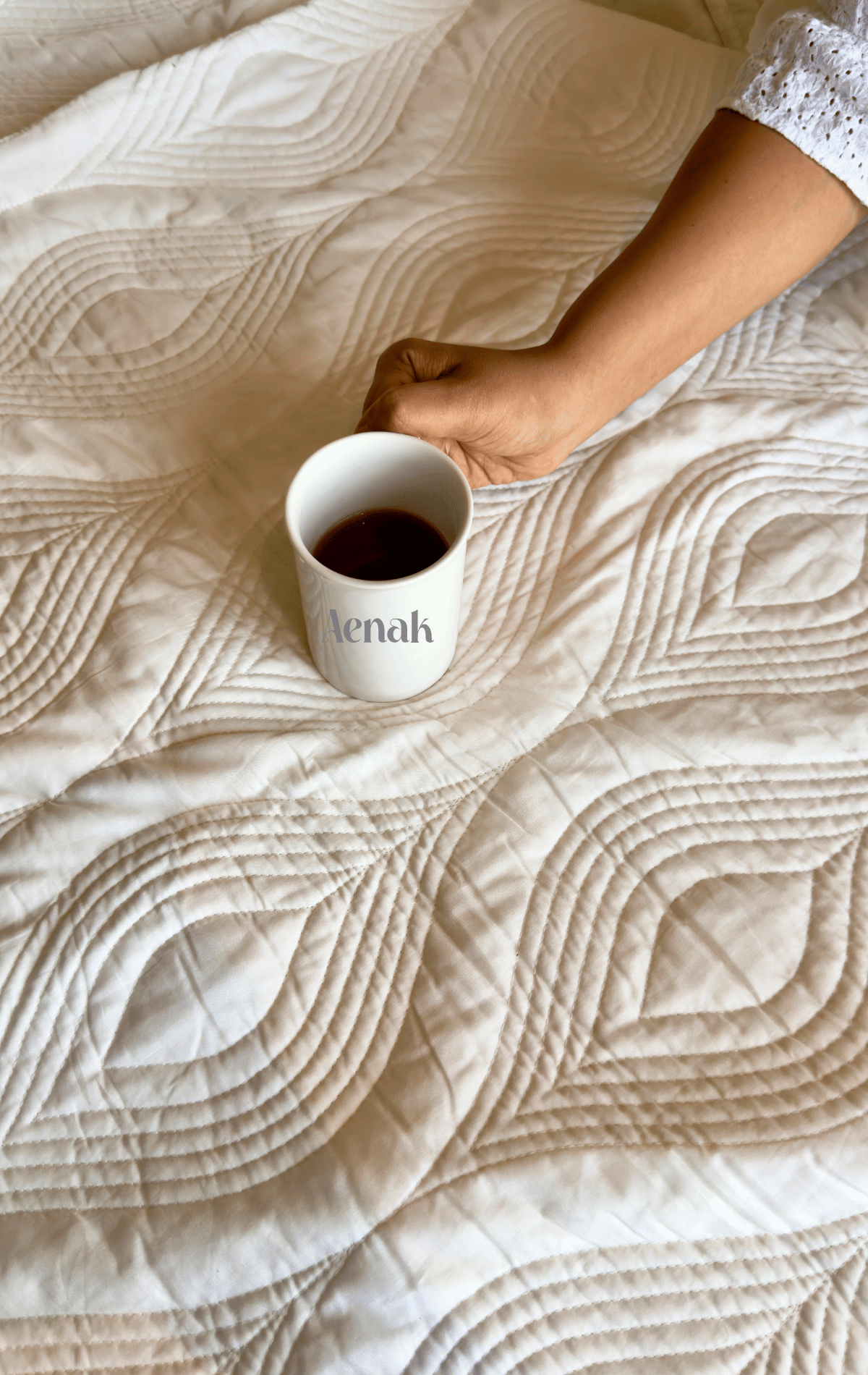 White Embossed Quilted Bedcover with Blue Lace