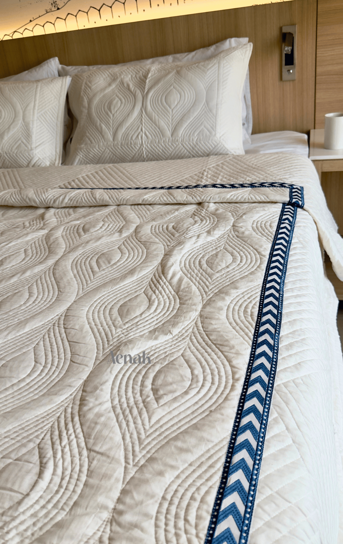 White Embossed Quilted Bedcover with Blue Lace