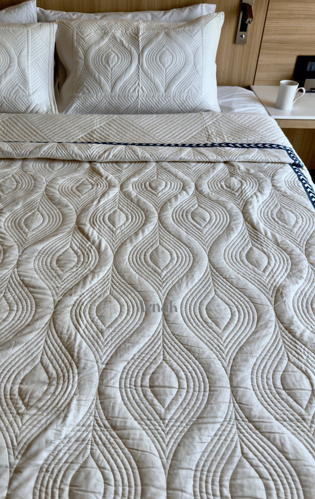 White Embossed Quilted Bedcover with Blue Lace
