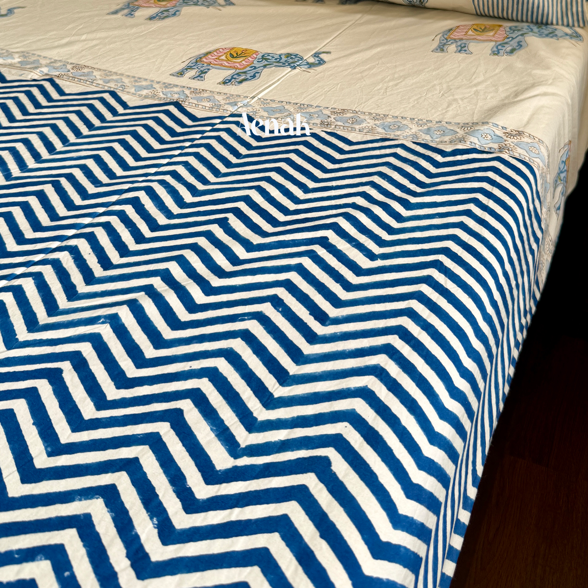 Blue pink white premium cotton bedsheet for soft and refreshing bedroom styling by Aenak
