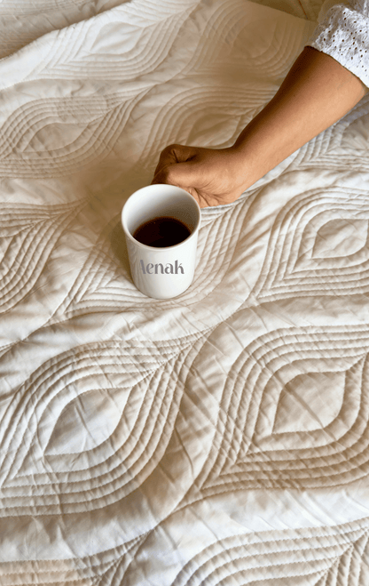 White Embossed Quilted Bedcover with Blue Lace