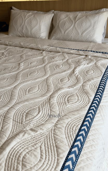 White Embossed Quilted Bedcover with Blue Lace
