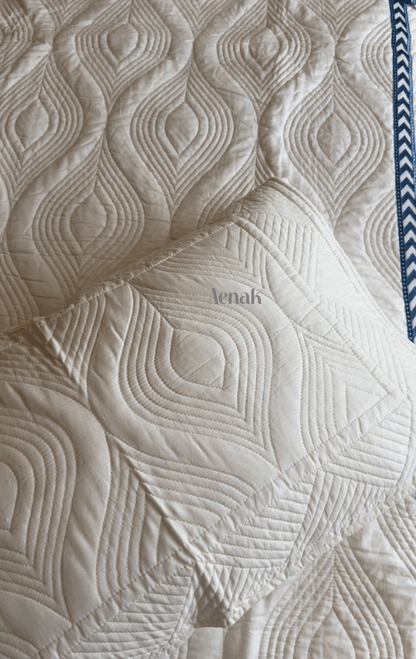 White Embossed Quilted Bedcover with Blue Lace
