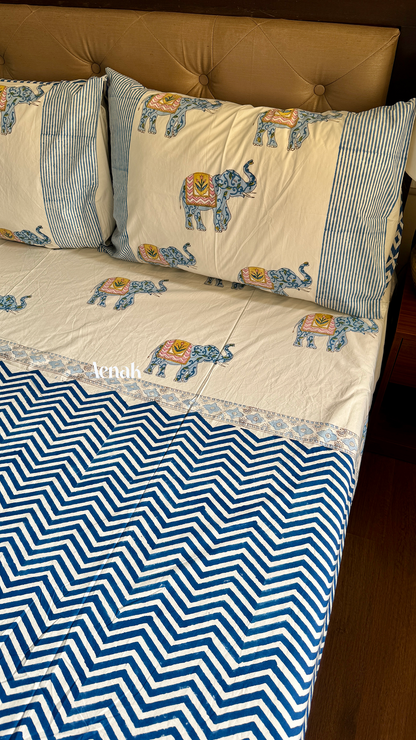 Handblock printed cotton bedsheet with reversible pillow covers in blue pink and white