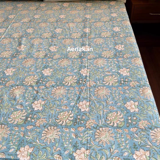 Handblock printed cotton bedsheet with reversible pillow covers in yellow and blue