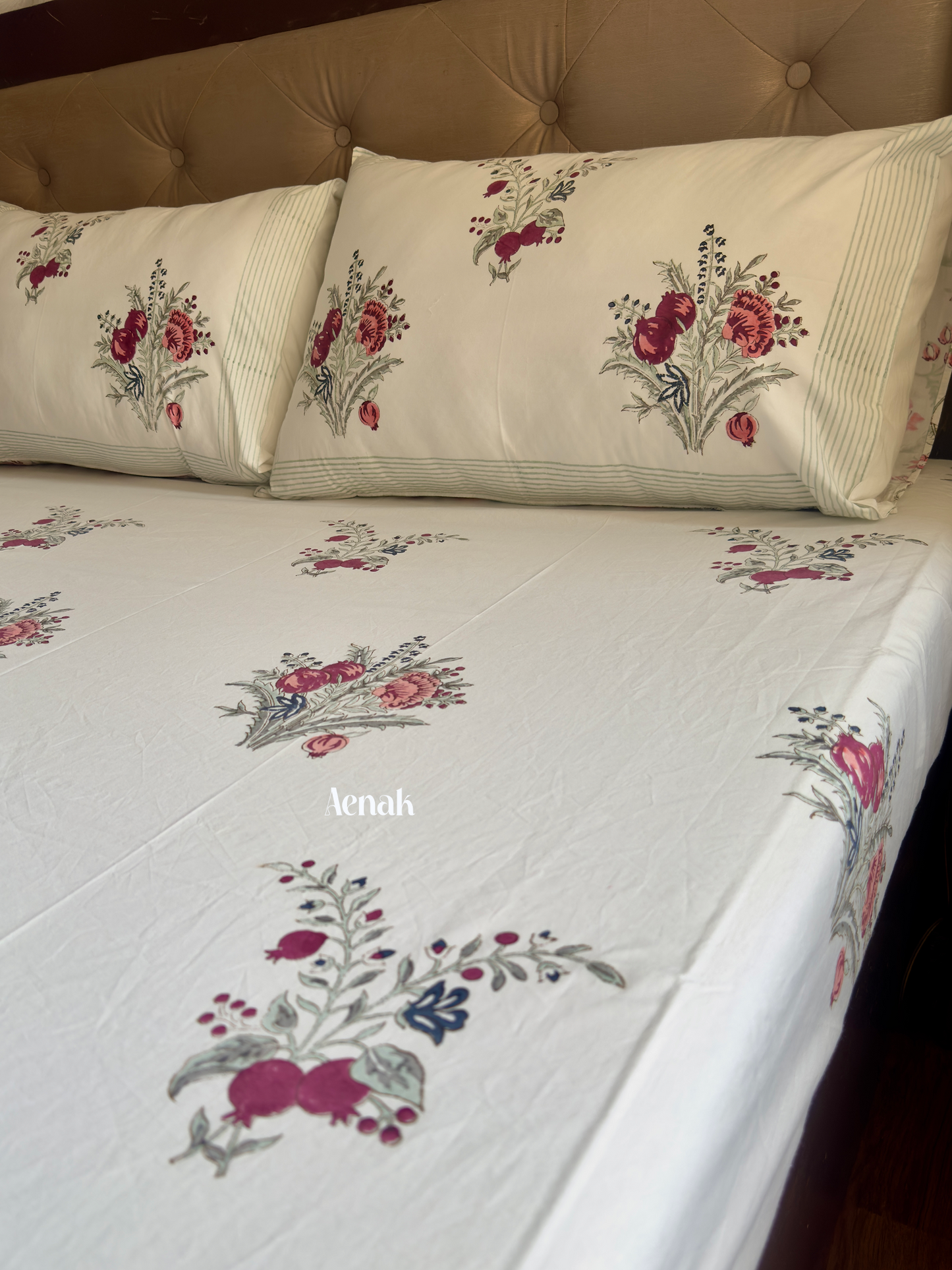 Handblock printed cotton bedsheet with reversible pillow covers in burgundy green and blue