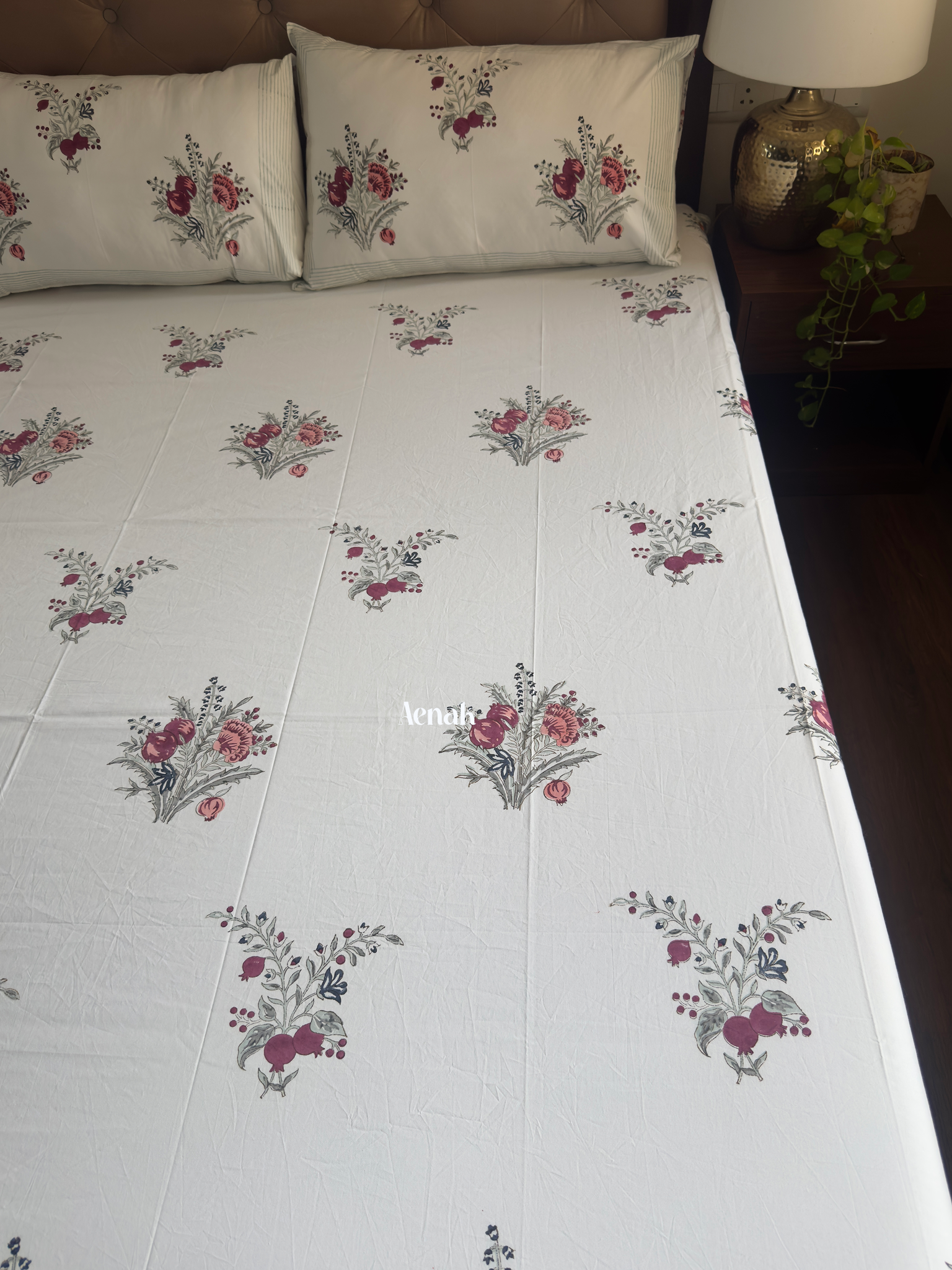 Custom fitted premium cotton bedsheet in burgundy green and blue handblock print by Aenak