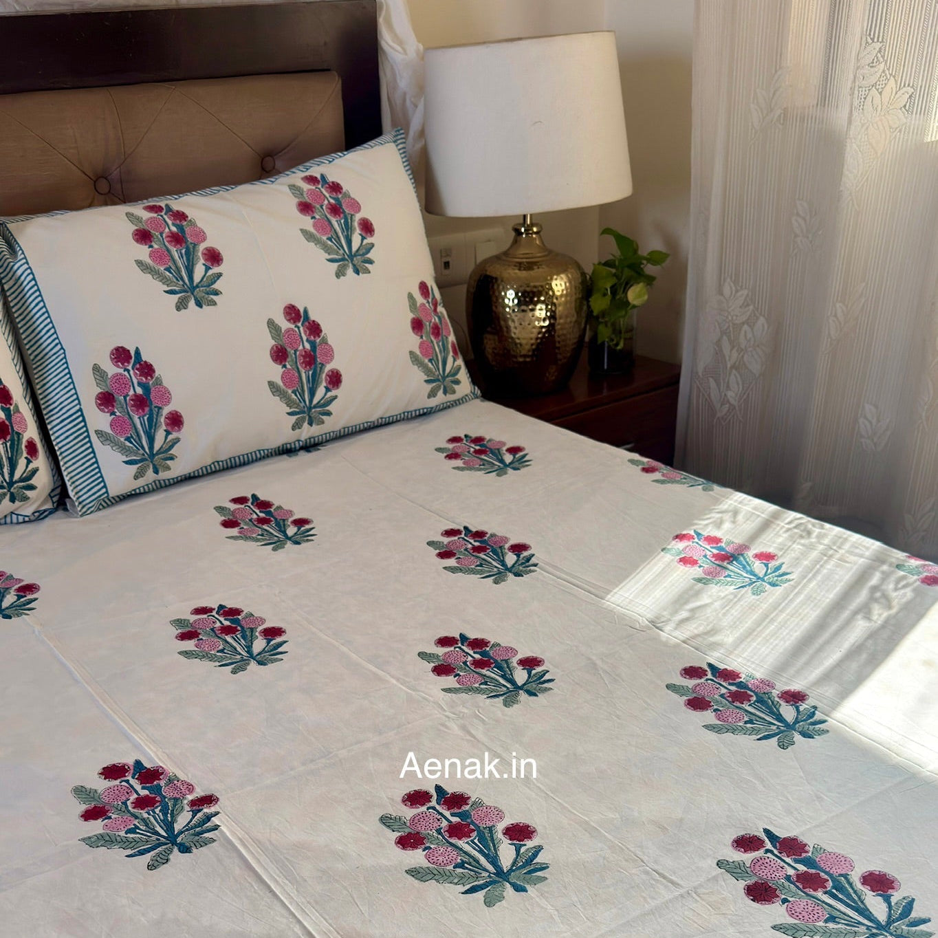 Green and pink 300 TC premium cotton bedsheet with handblock prints by Aenak