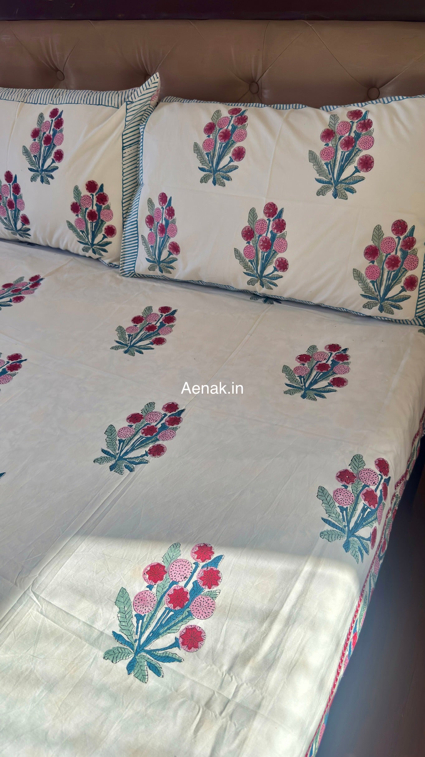 Green pink premium cotton bedsheet for cheerful and graceful bedroom styling by Aenak