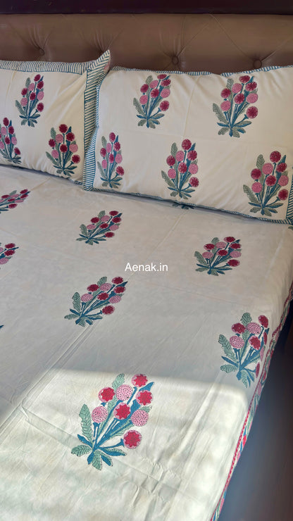 Green pink premium cotton bedsheet for cheerful and graceful bedroom styling by Aenak