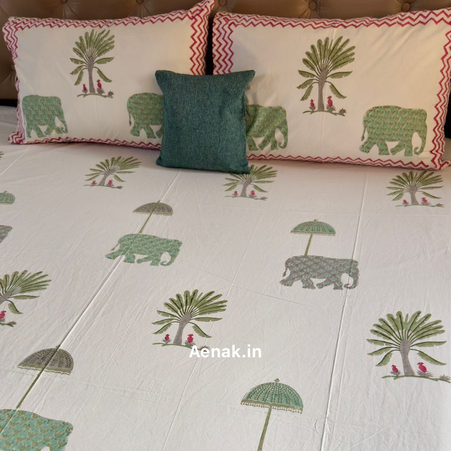 Green and pink 300 TC premium cotton bedsheet with handblock prints by Aenak
