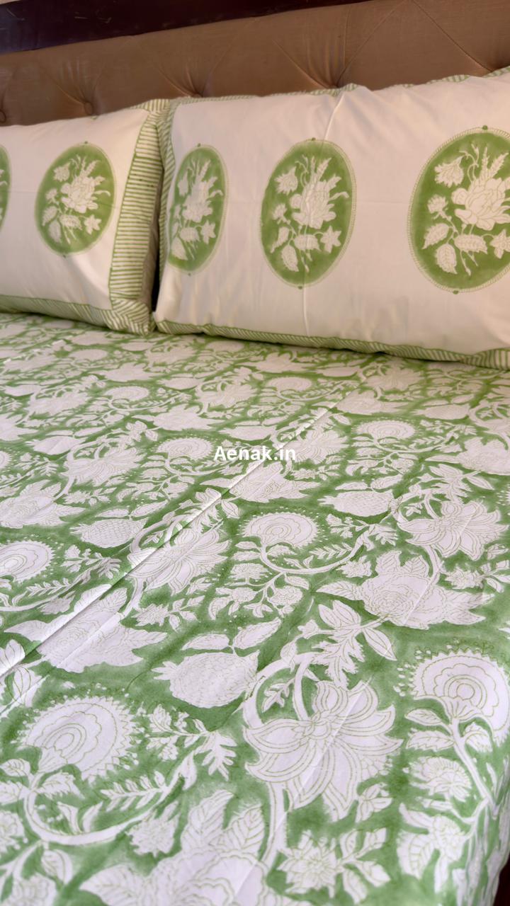 Handblock printed cotton bedsheet with reversible pillow covers in white and green