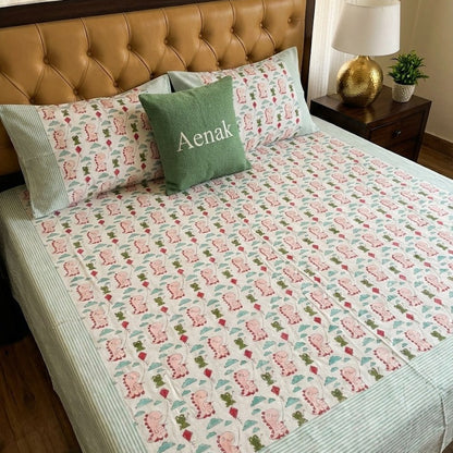 Green and pink 300 TC premium cotton bedsheet with handblock prints by Aenak
