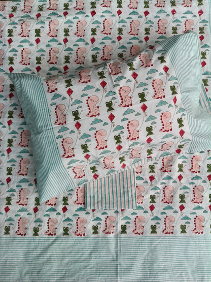 Handblock printed cotton bedsheet with reversible pillow covers in green and pink