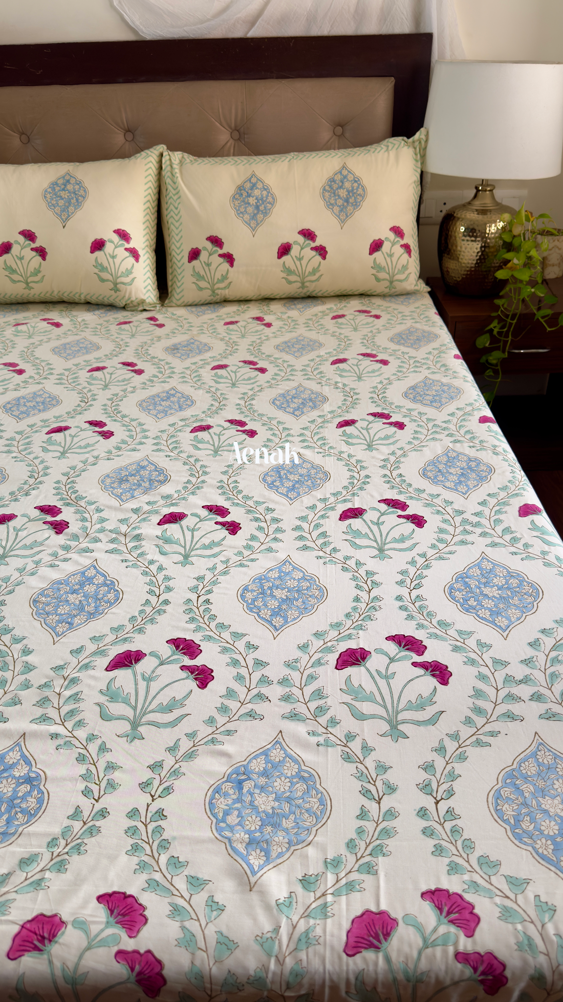 Handblock printed cotton bedsheet with reversible pillow covers in beige pink and blue