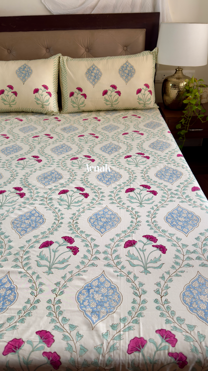 Handblock printed cotton bedsheet with reversible pillow covers in beige pink and blue