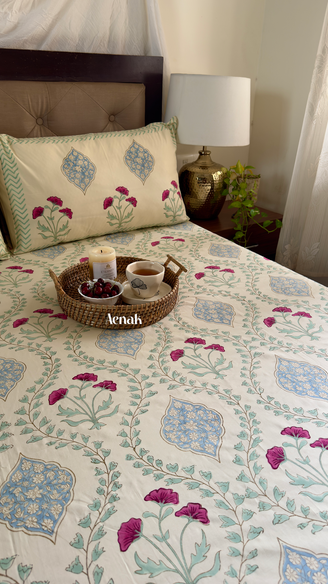 Custom fitted cotton bedsheet in beige pink sage green and blue handblock print by Aenak