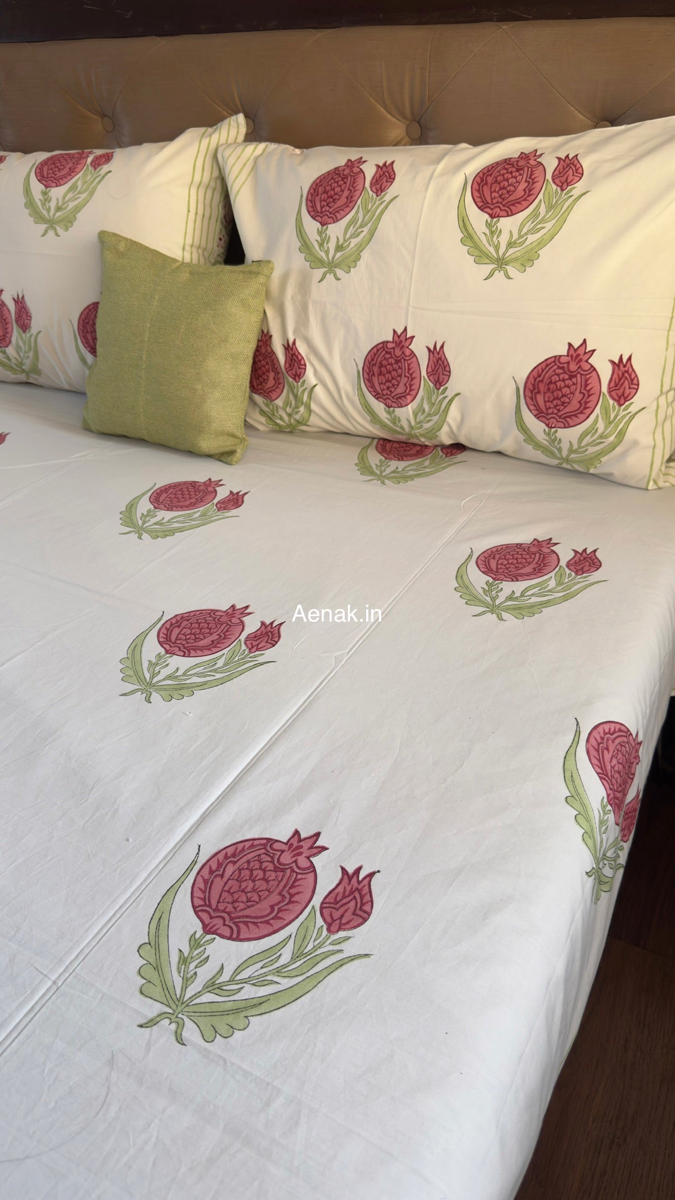 Handblock printed cotton bedsheet with reversible pillow covers in pink and green