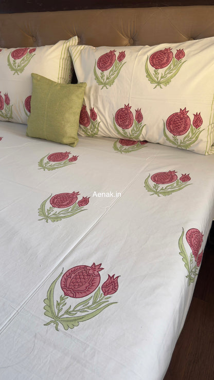 Handblock printed cotton bedsheet with reversible pillow covers in pink and green