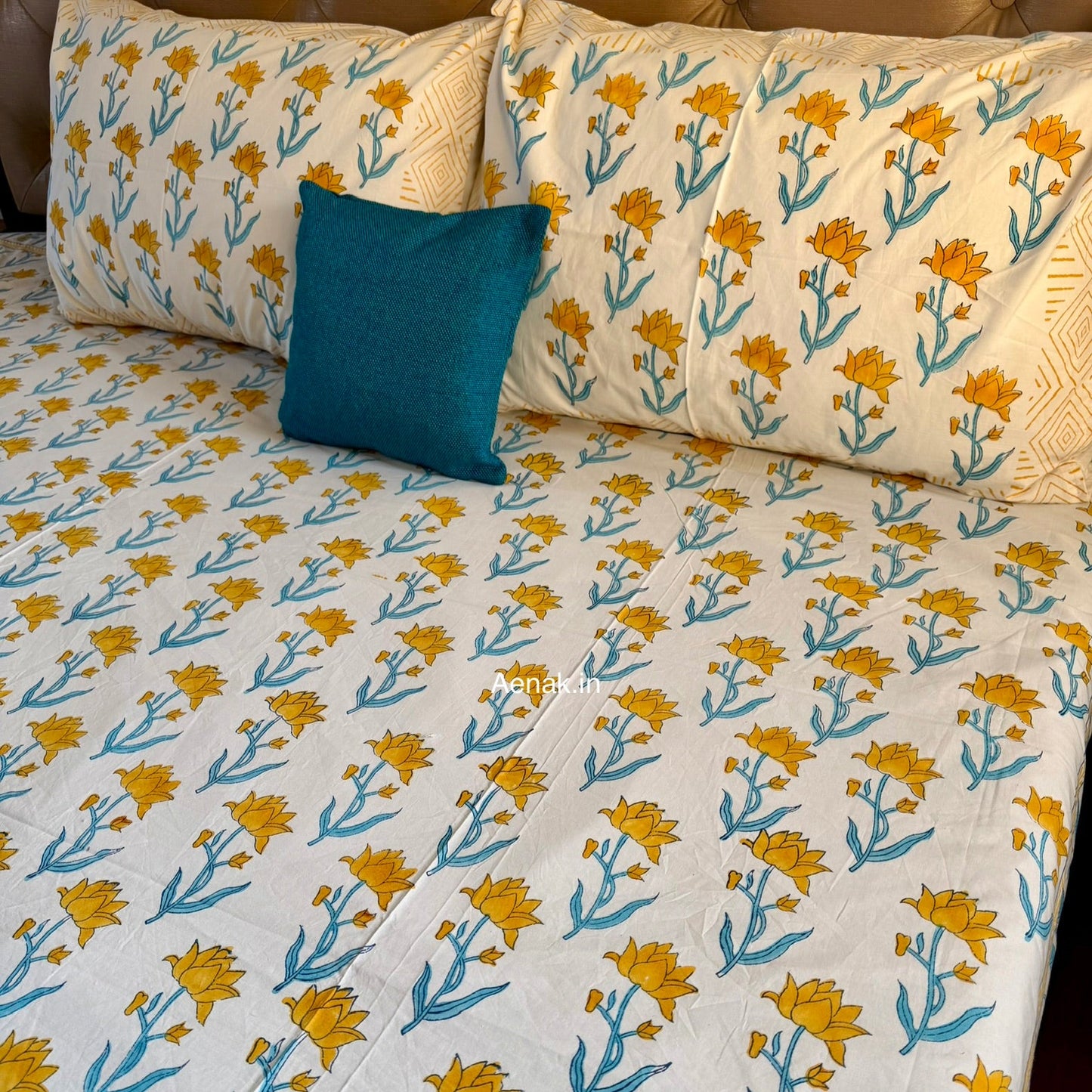 Yellow and blue 300 TC premium cotton bedsheet with handblock prints by Aenak