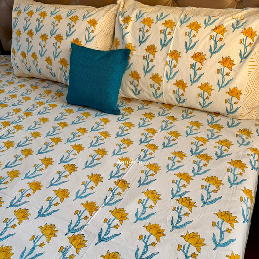 Yellow and blue 300 TC premium cotton bedsheet with handblock prints by Aenak