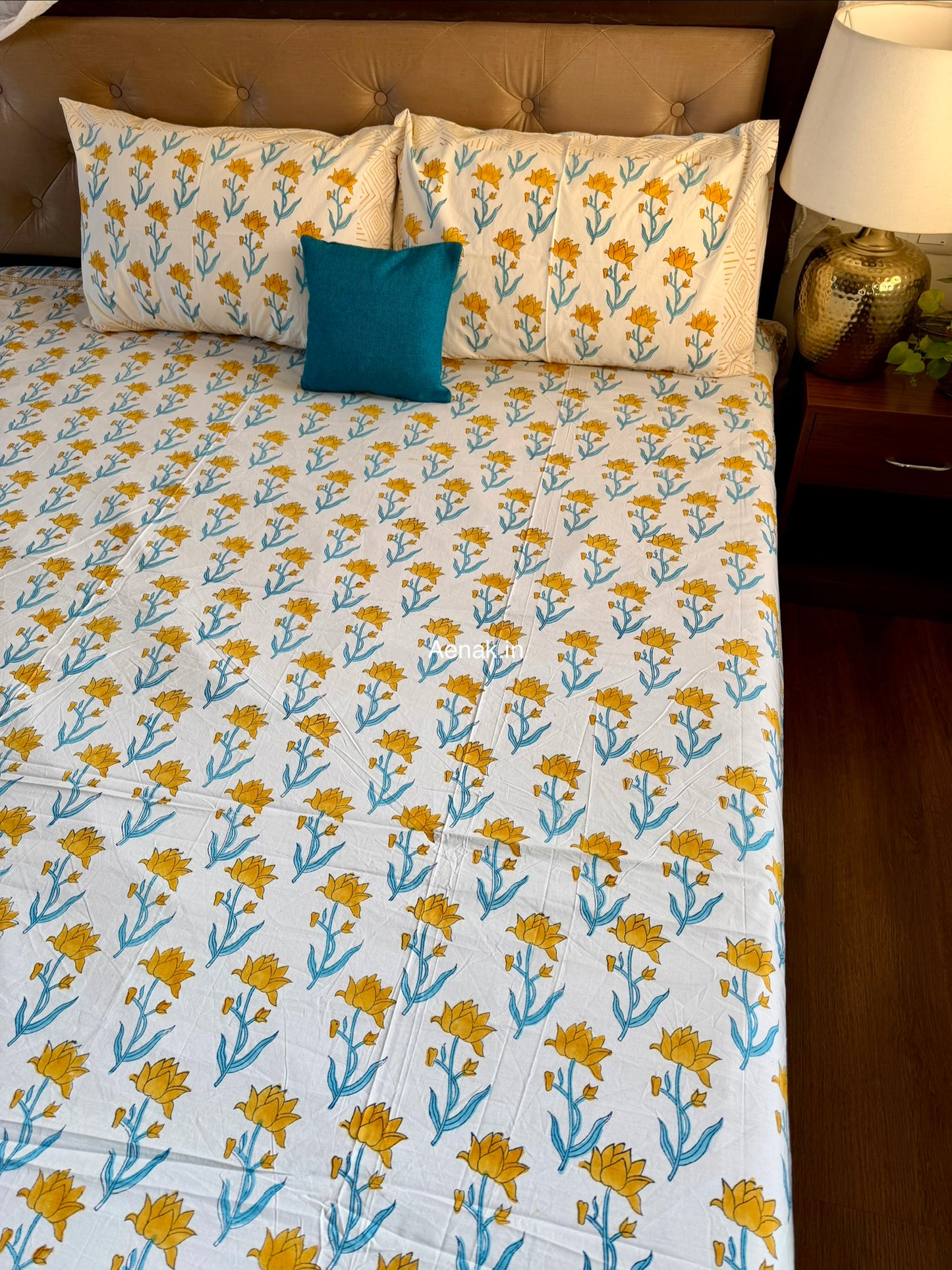 Yellow blue premium cotton bedsheet for bright and cheerful bedroom styling by Aenak