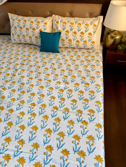 Yellow blue premium cotton bedsheet for bright and cheerful bedroom styling by Aenak