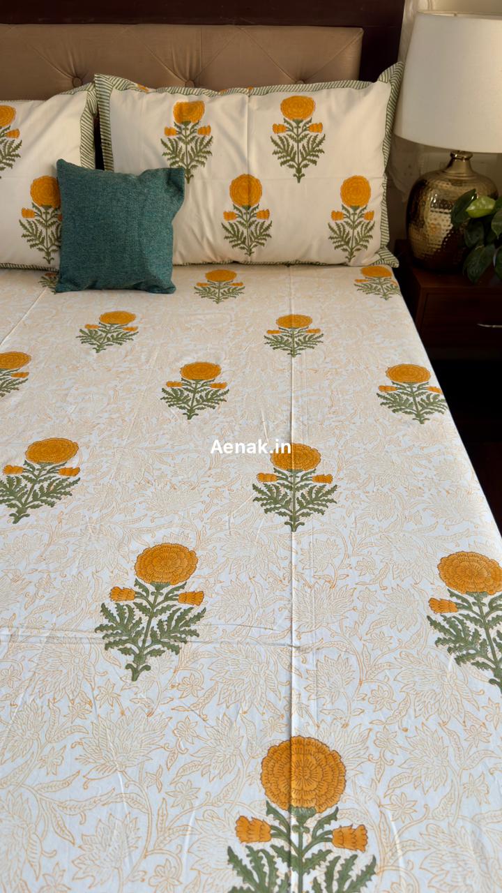 Aenak organic percale cotton bedsheet in yellow and green handblock print