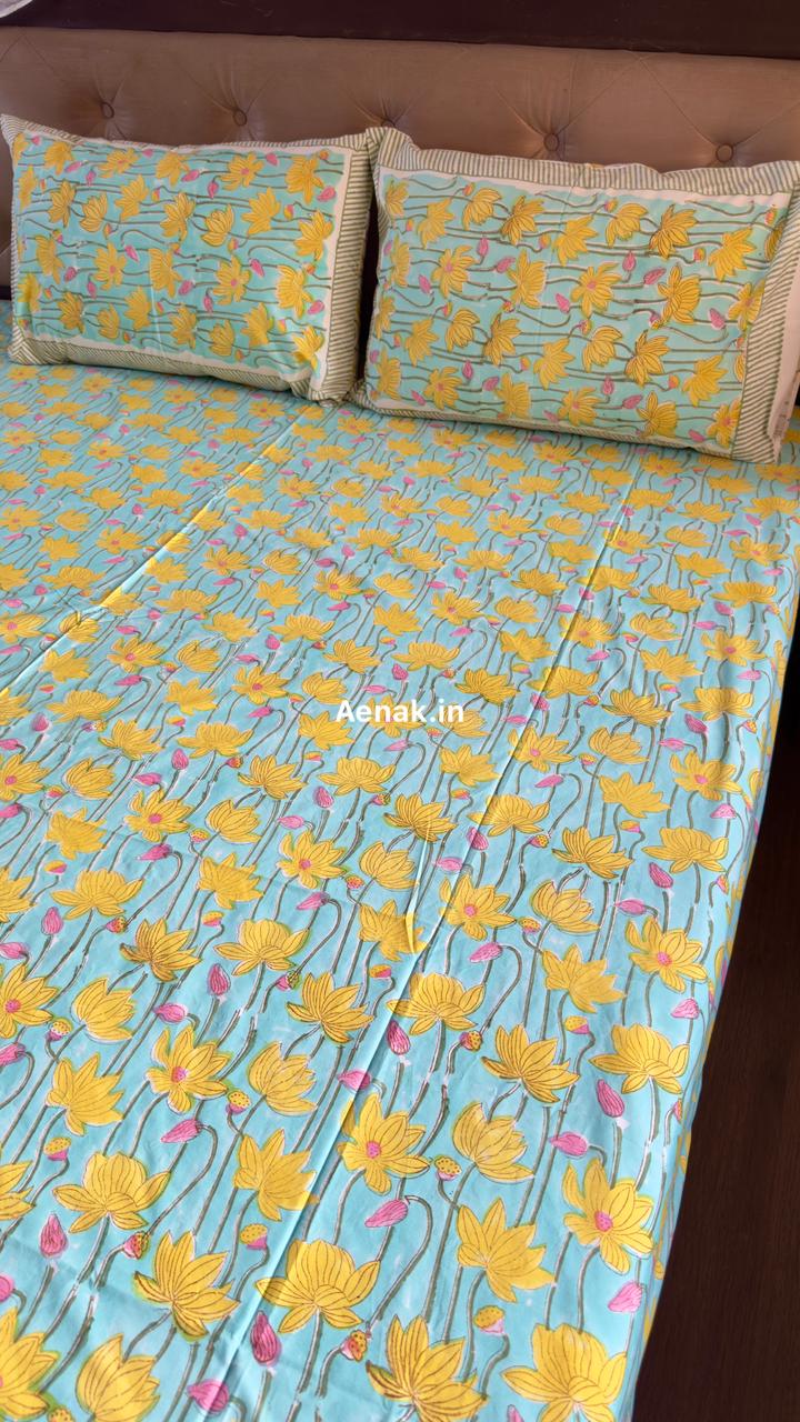Aenak organic percale cotton bedsheet in yellow blue and pink handblock print